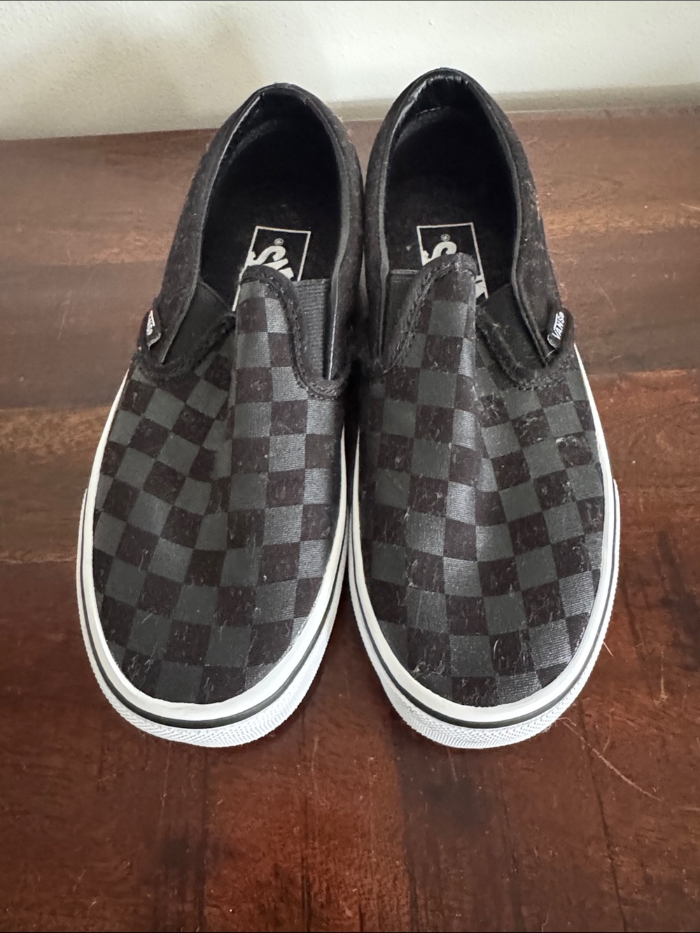 Vans Black and Gray Checkerboard Slip-On Sneakers